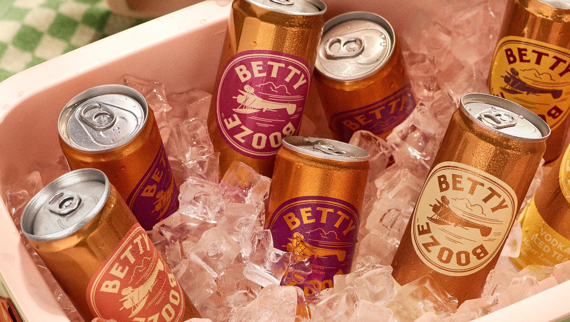 Cans of Betty Booze on ice in a  cooler
