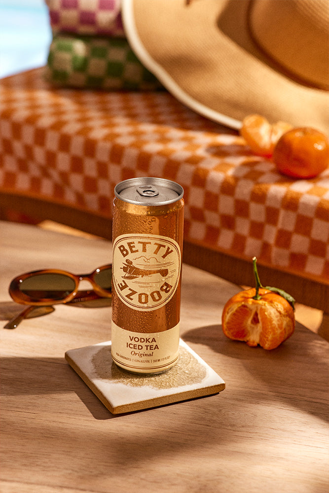 Betty Booze Vodka Iced Tea Original next to sunglasses