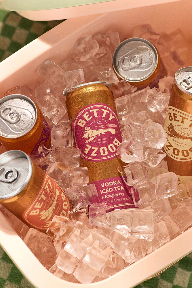 Betty Booze Vodka Iced Tea + Raspberry in a cooler with ice